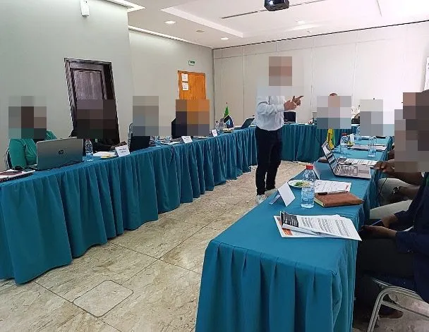 A TPC capacity-building session in progress; faces are pixelated