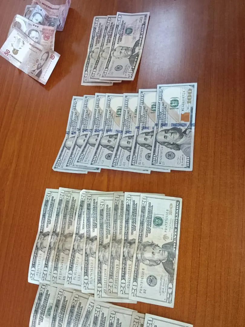 Cash recovered at Lomahasha, counted on a table